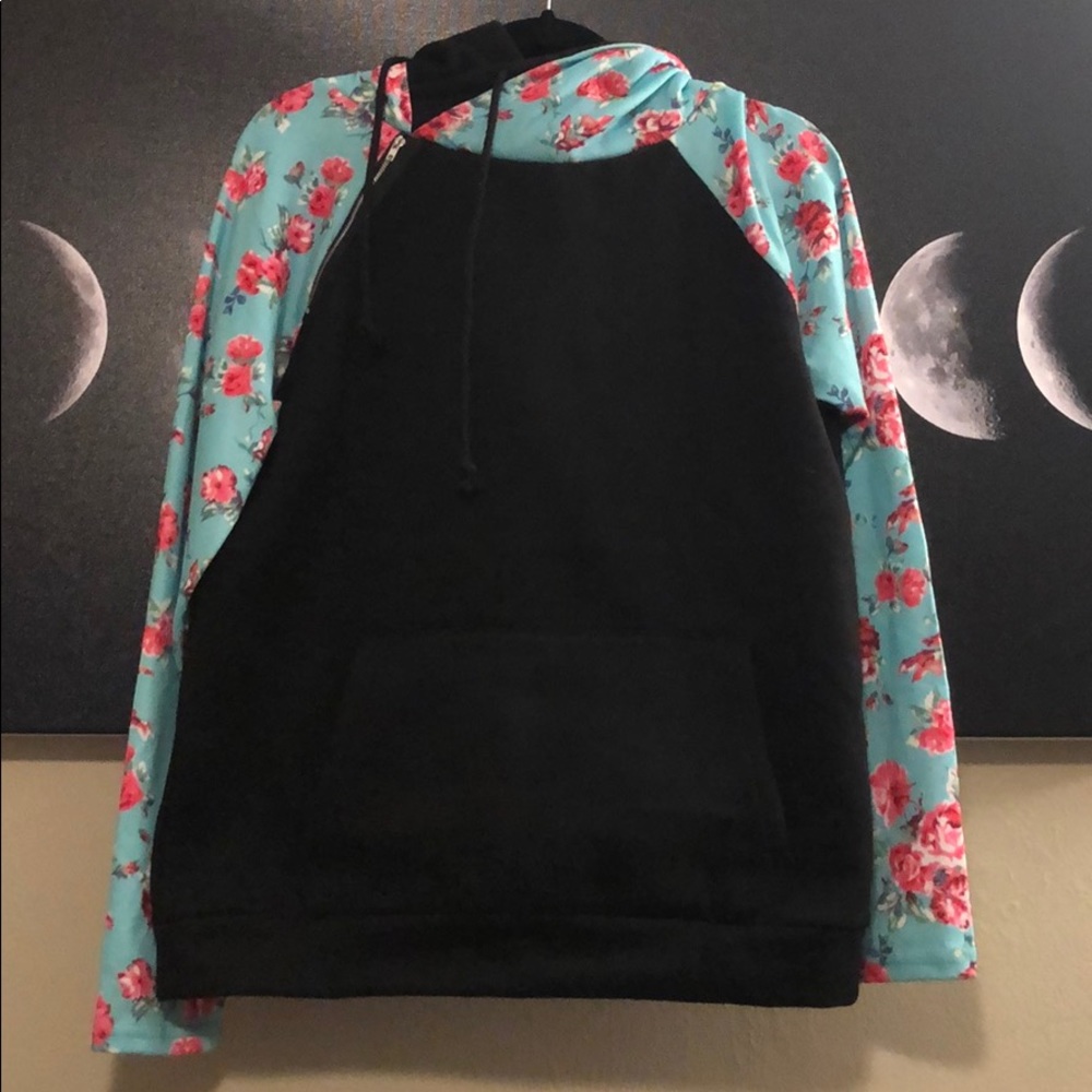 Unique floral and black pullover hoodie.